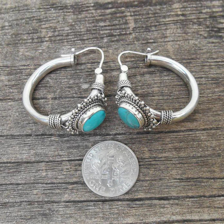 Pendientes retro azul turquesa Chic™ de Rose & Oliver, estilo vintage con detalles elegantes y acabamento brillante.