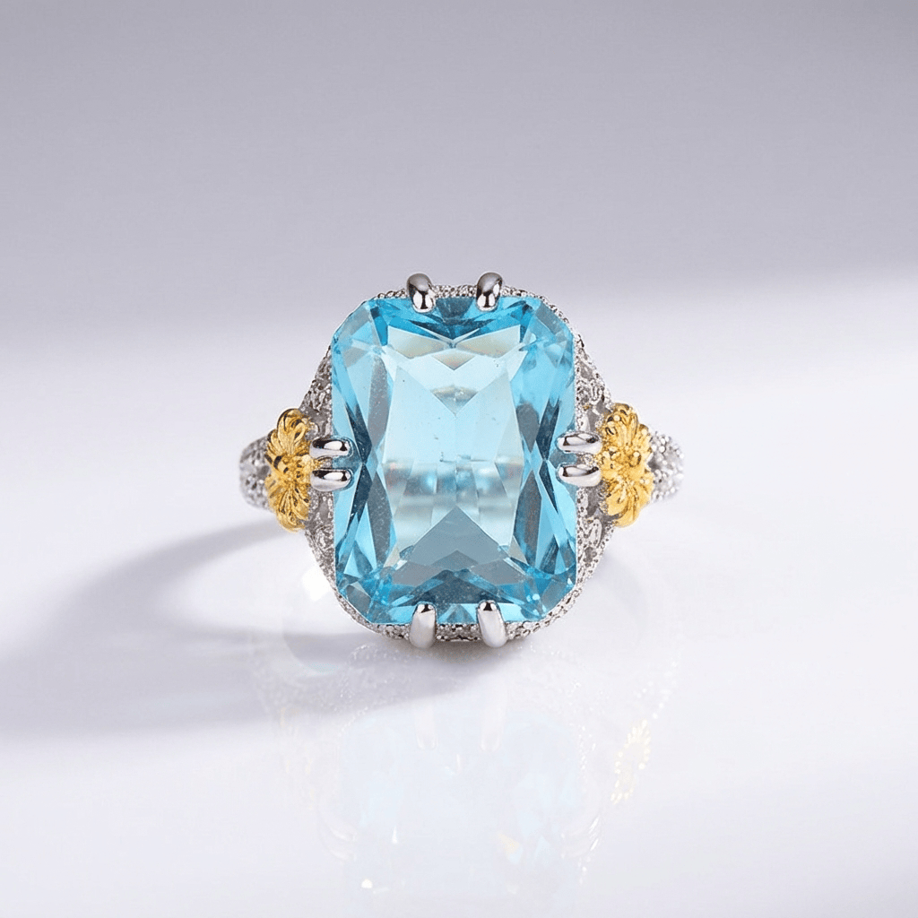 Vintage-Ring mit goldfarbenem Aquamarin von Rose & Oliver, elegantes Detail und blauer Stein in antikem Silber.