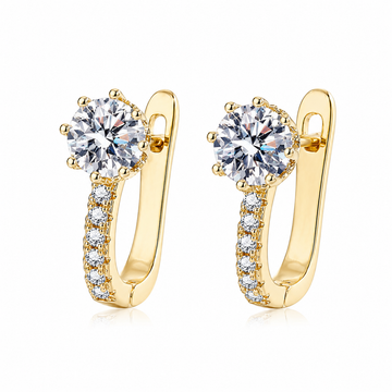 Brincos huggie de canal em ouro Rose & Oliver, pequenos e elegantes, com acabamento brilhante, para uso diário.