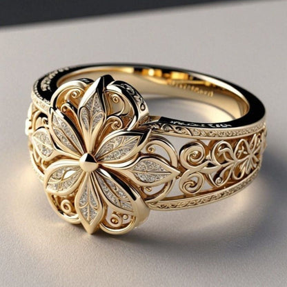 Ring Rose & Oliver mit exotischem goldenen Zirkon und floralen Details, elegante Verarbeitung und glänzende Goldoberfläche.