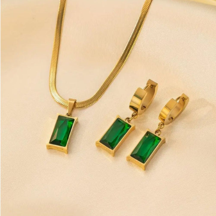 Conjunto de joyas Iselotte Verdain de Rose & Oliver con brazalete dorado y detalles elegantes, mostrado en la imagen.