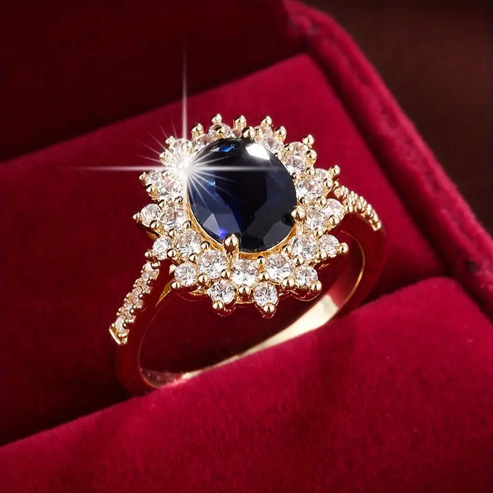 Anillo Vionne Saphirae Rose & Oliver en oro, con diseño delicado y detalles elegantes, destacándose en la imagen.